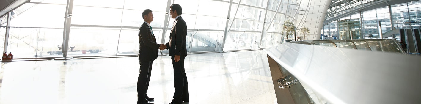 Handshake in entrance hall of the incheon international airport